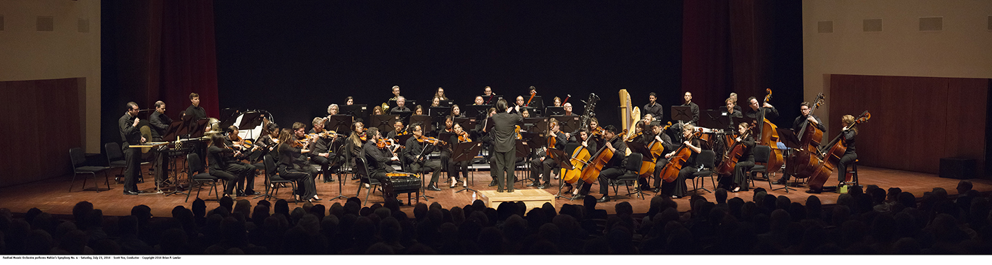 This is a panoramic photo of the orchestra performing Mahler at the Performing Arts Center on the Cal Poly campus.